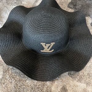 Designer like beach floppy hats. Gucci and LV